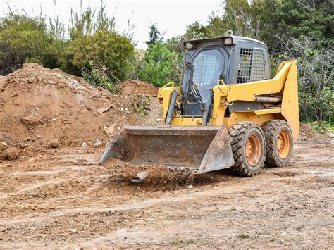 skid steer construction vehicle|what is a skid loader.